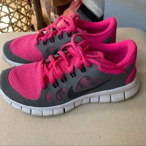 Nike free runs tennis shoes.  almost new